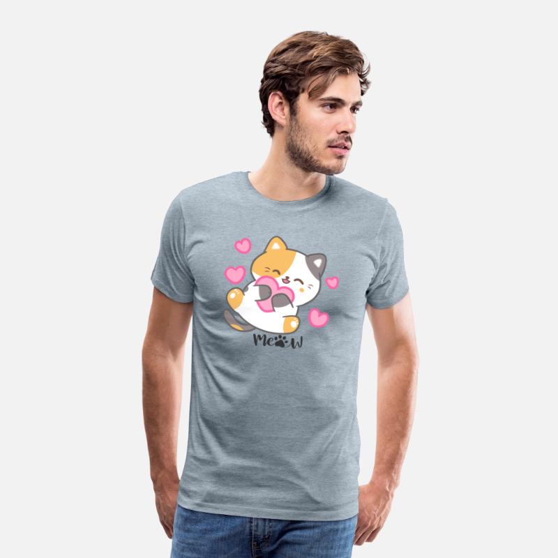 Calico cat holding a pink heart
