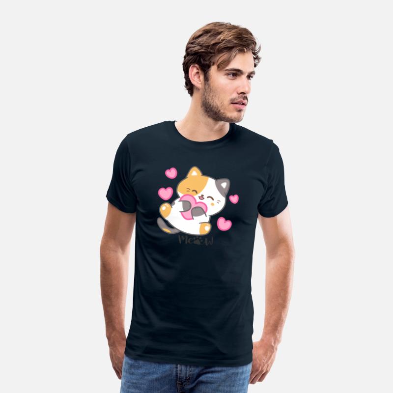 Calico cat holding a pink heart