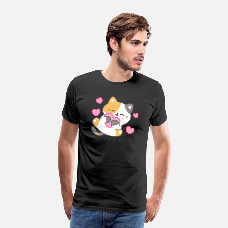 Calico cat holding a pink heart