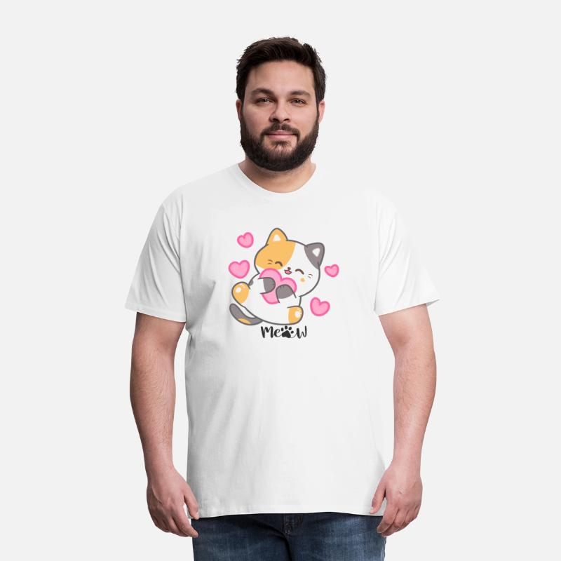 Calico cat holding a pink heart