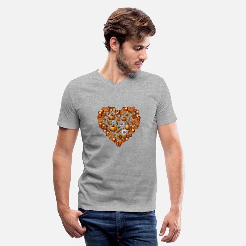 Heart filled with pumpkins, leaves and nuts