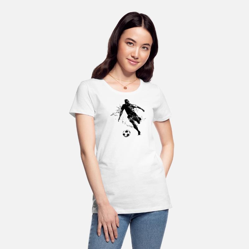 Soccer Player Kicks A Soccer Ball